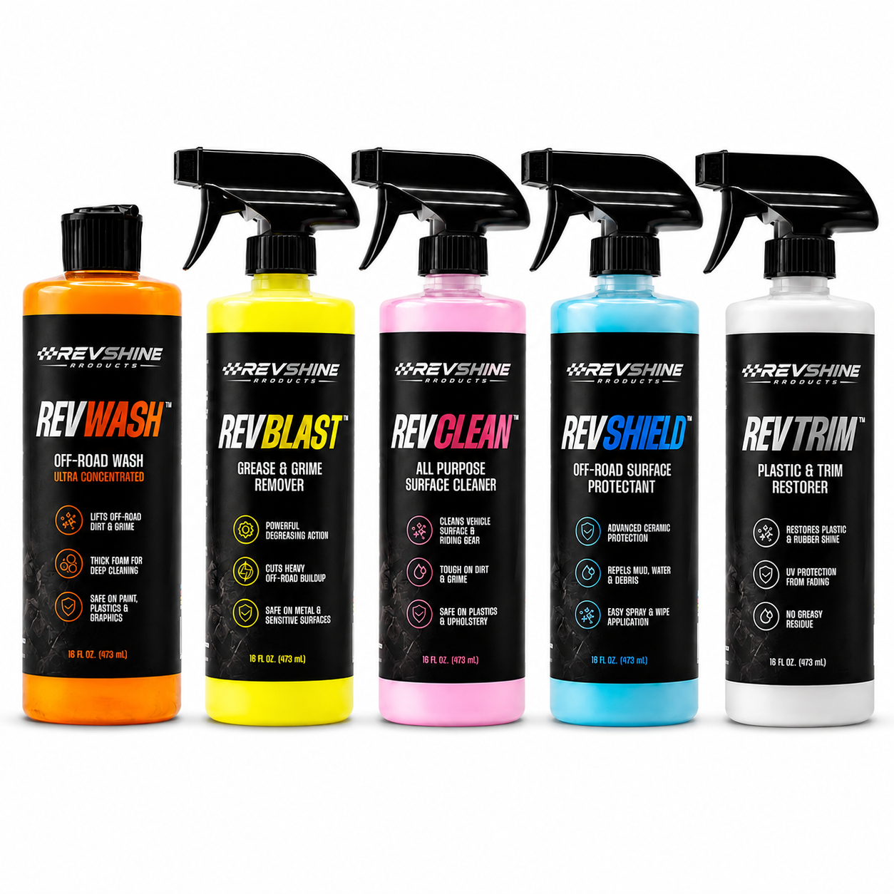 Five RevShine Professional cleaning products in spray bottles lined up against a white background: RevWash (orange), RevBlast (yellow), RevClean (pink), RevShield (light blue), and RevTrim (white). Each bottle has a black trigger sprayer and a black label with white and colored text.
