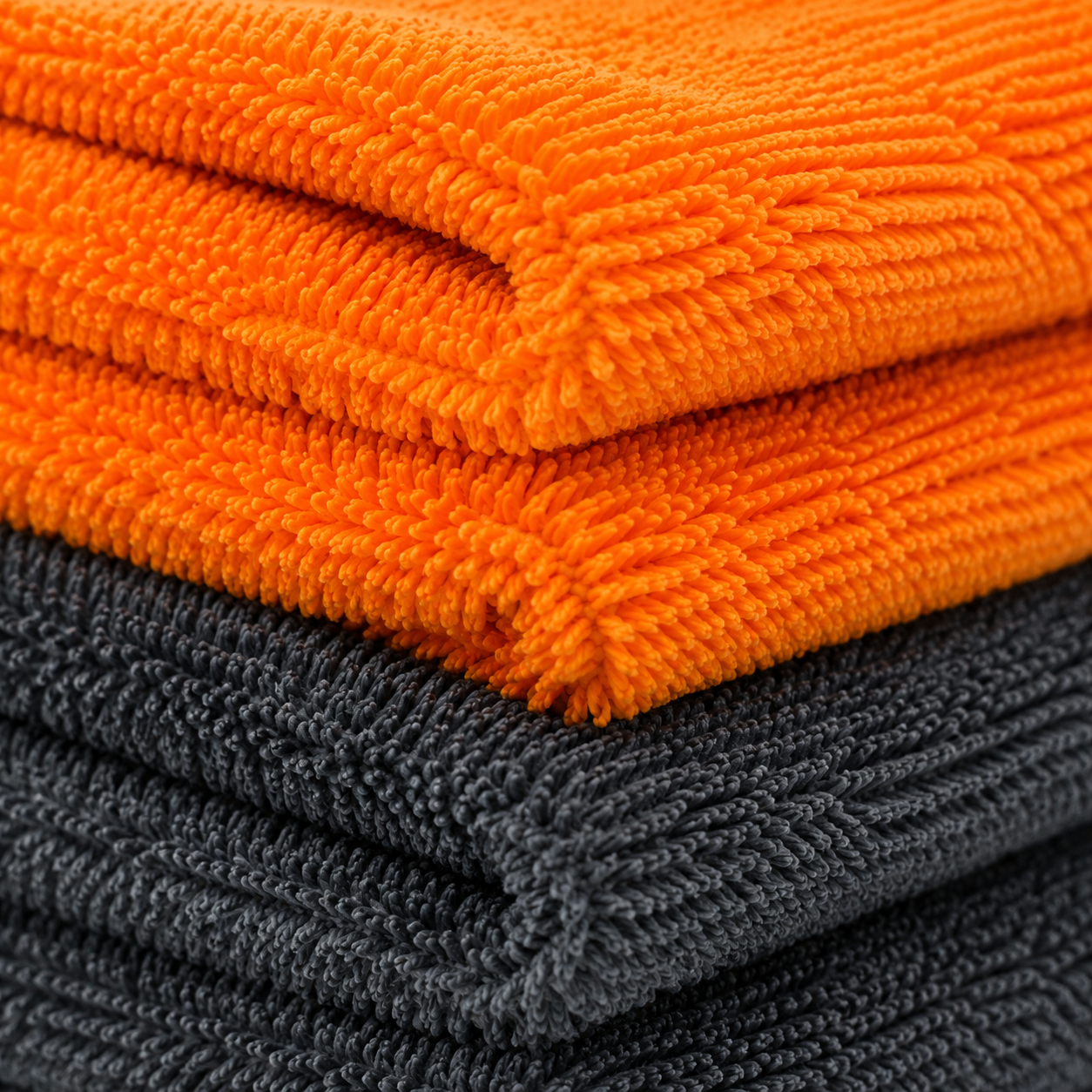 Set of four RevShine Premium Microfiber Towels showing soft, absorbent microfiber fabric in various colors for cleaning and detailing.